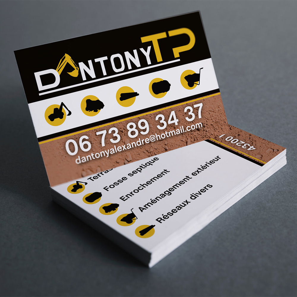 A2com - Carte de visite Dantony TP Carte de visite de trois couleurs, noir, blanc et effet sable. Dantony TP en blanc et jaune sur le haut de la carte.